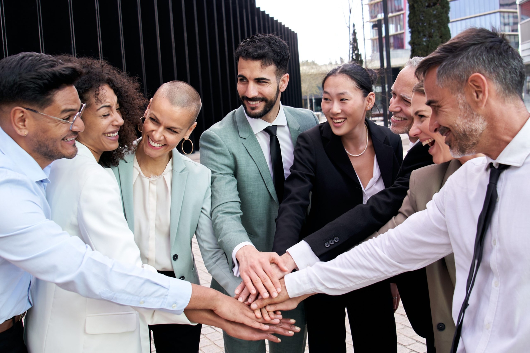 Multicultural happy business group team building t